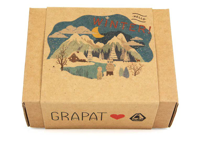 Kraft paper box with winter-themed illustration and 'GRAPAT' branding